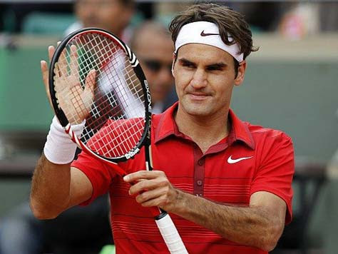 Roger Federer aplaudiendo